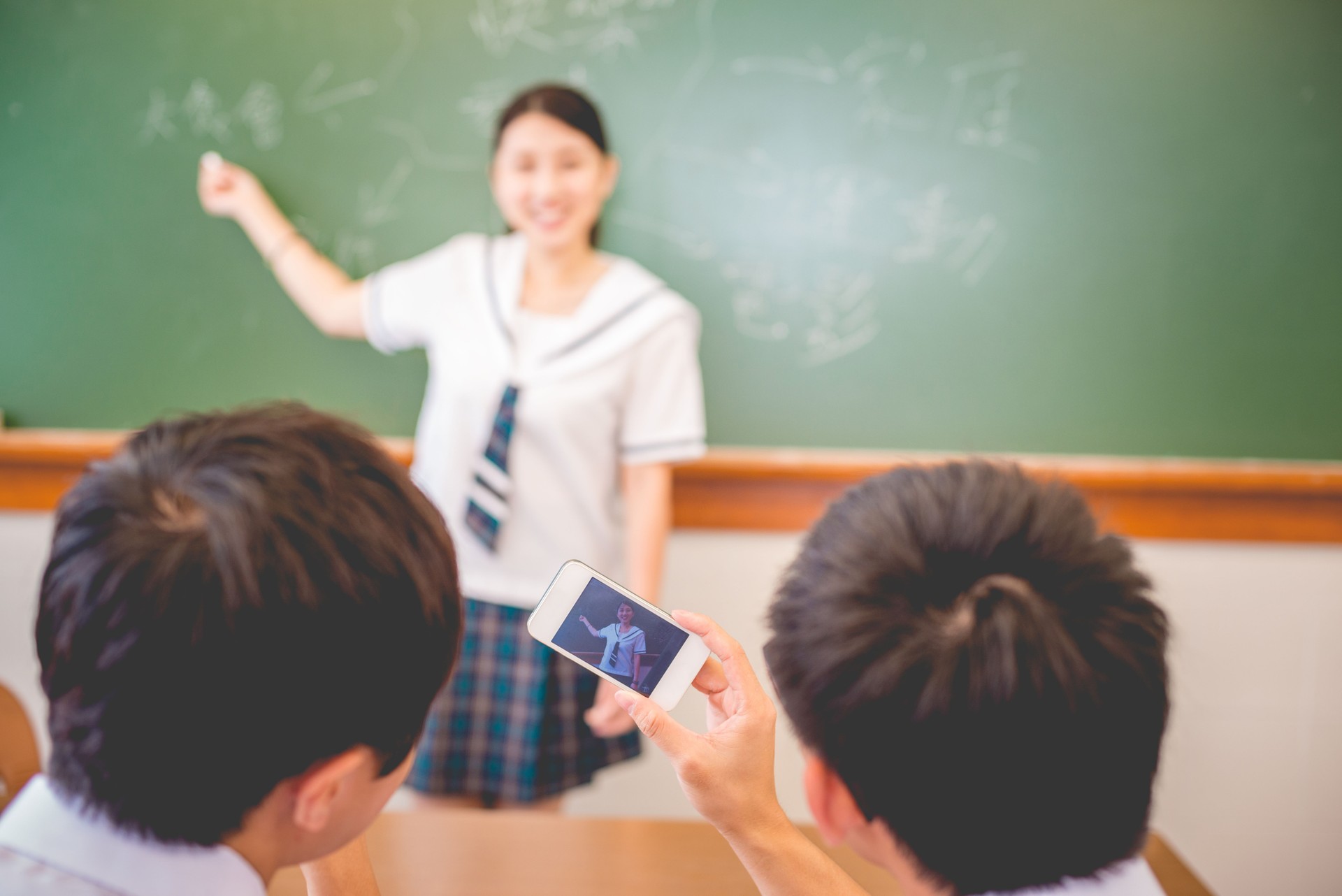 Female Student Writing Happy Words, Chinese and English, Hong Kong